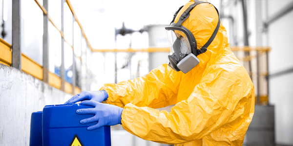 biohazard cleanup person in hazmat suit